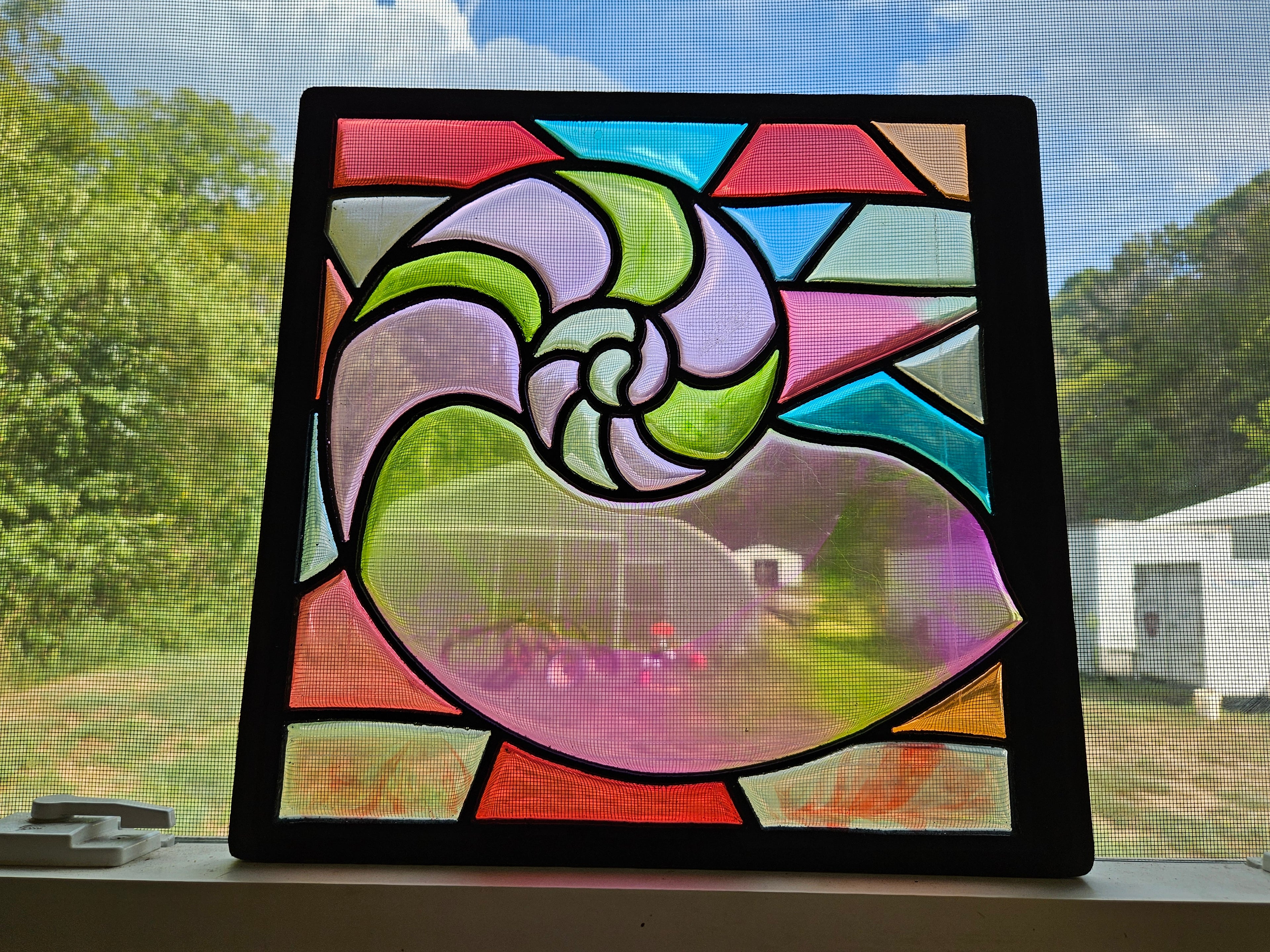 RESIN LIGHT CATCHER NAUTILUS SHELL